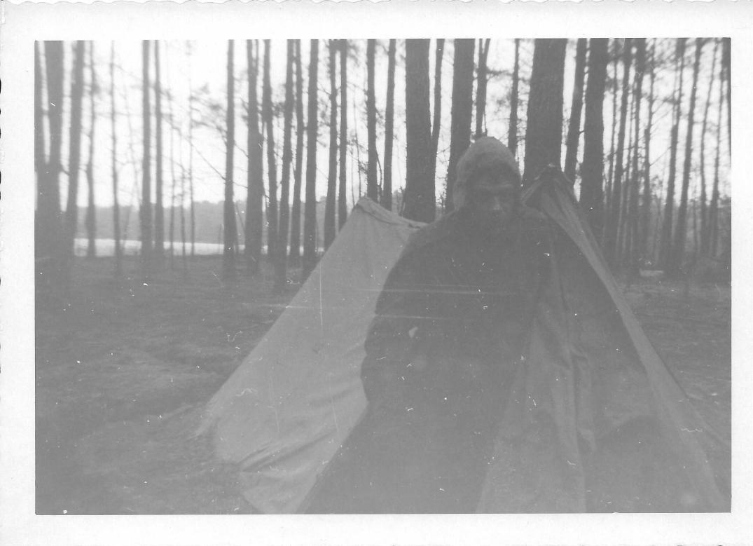 174 MASH Bernie emerging from our tent Ft Eustice